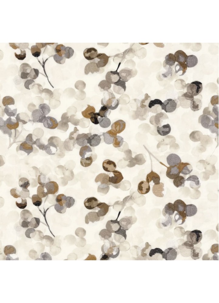 Détails des médaillons brodés du tissu Lunaria – finition élégante